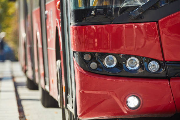 istock Red bus for public transportation on city streets. 2206473920