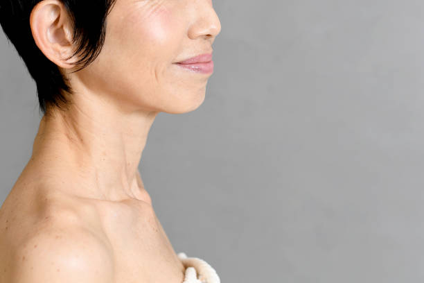 istock Profile of a smiling middle-aged Asian woman 2206475247