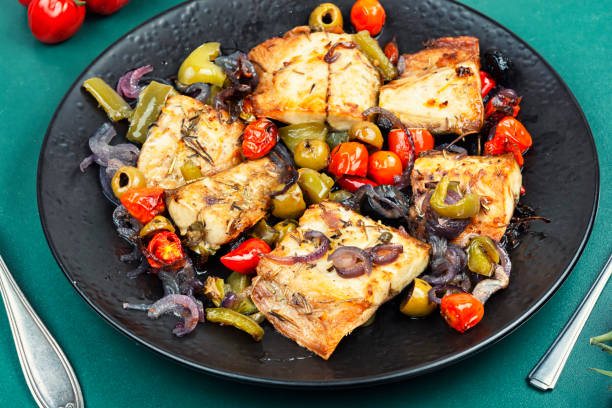 Fish fillet and baked vegetables.