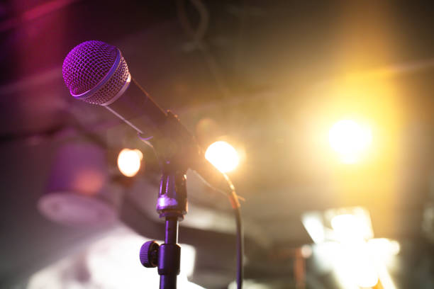 istock Close-up of a microphone in a live concert show 2206479111