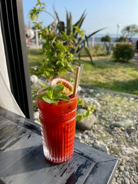 istock Refreshing Tropical Cocktail with Passion Fruit and Mint Garnish 2206479223
