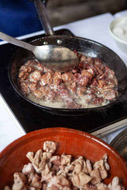 istock Cook cooking meat in fat 2206481047