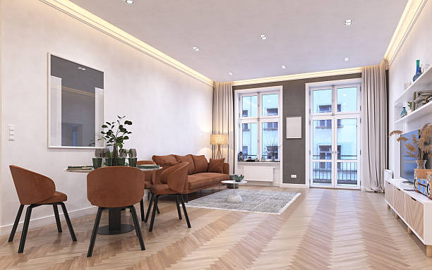 istock living room with orange sofa, dining area, and plants 2206484732