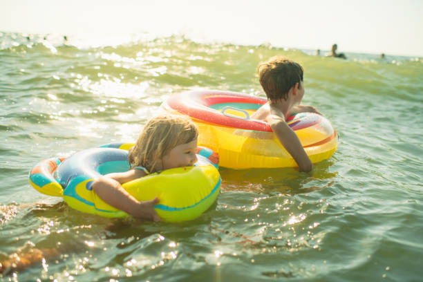 istock Children enjoying beach holidays 2206490938