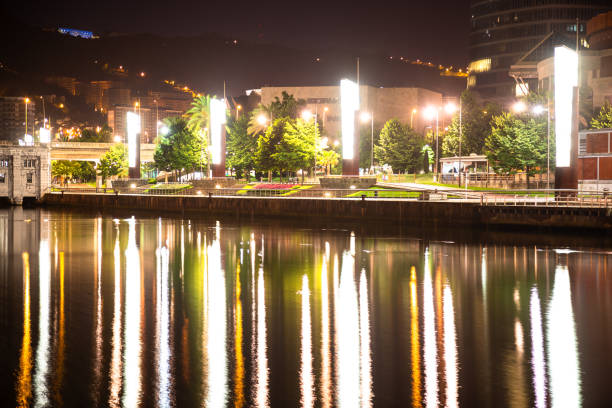 Early morning walk in Bilbao Famous Bilbao river promenade at night Spain Europe