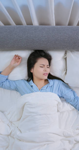 istock asian woman poor sleep quality 2206494345
