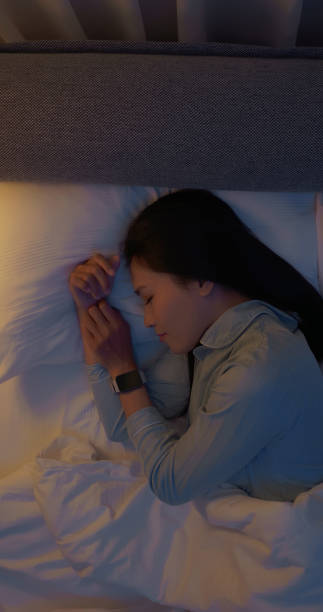 istock asian woman good sleep quality 2206494548