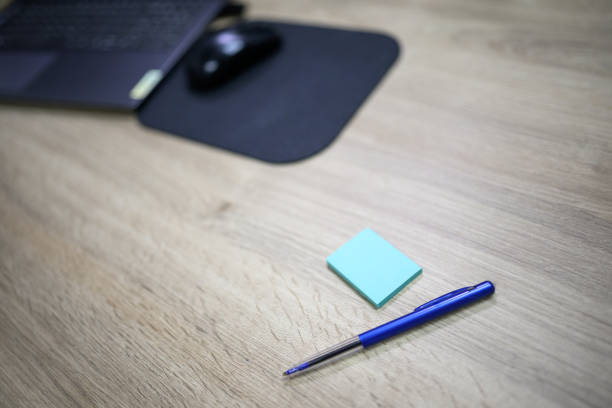 Office desk in hospital admin office with sticky notes no people backgrounds