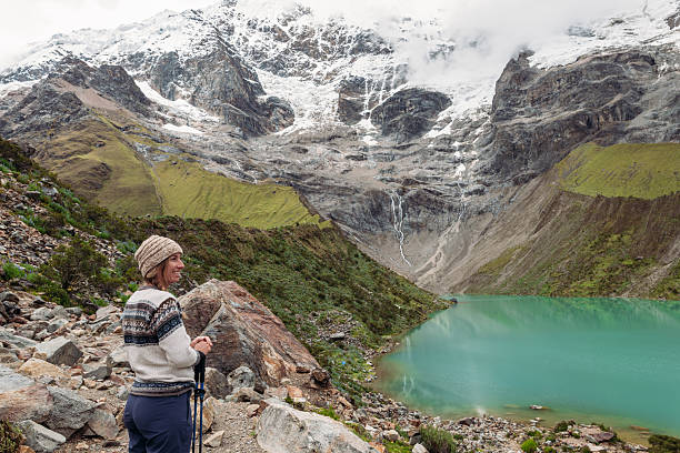 istock Person Admiring Scenic Mountain Lake View 2206496492