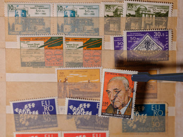 istock Stamp Collector Examining Turkish Postage Stamps 2206500143