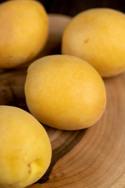 istock ripe soft apricot fruits on the cutting board 2206504225