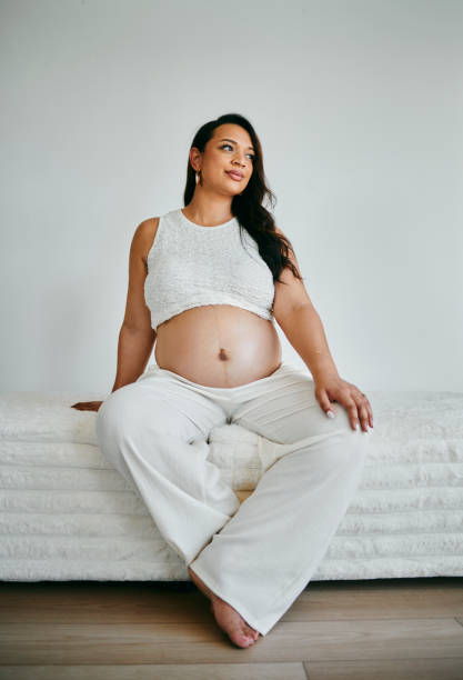 istock Pregnant Woman Relaxing in Calm Minimalist Setting 2206504676