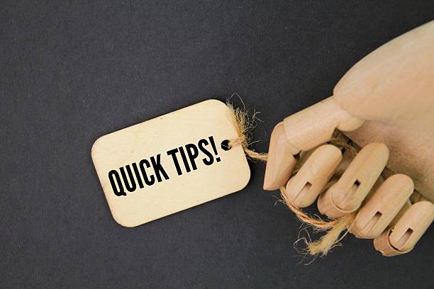 istock hands and wooden tags with the words QUICK TIPS! 2206506925