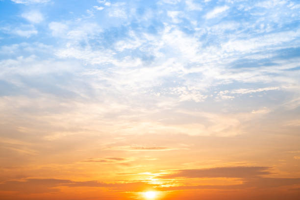 istock Beautiful , luxury soft gradient orange gold clouds and sunlight on the blue sky perfect for the background, take in evening,Twilight, Large size, high definition landscape photo 2206507900