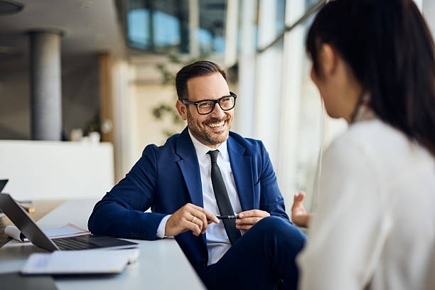 istock Professional Business Meeting Between Two Colleagues in a Modern Office Setting 2206511242