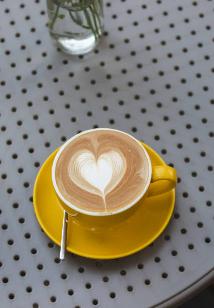 Larte art coffee cups on wood table
