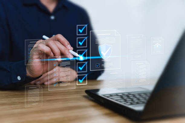 istock Electronic document management concept, paperless world, mutual agreement, HR documents, insurance, and real estate contracts with fast, accurate, and secure digital technology on a virtual screen. 2206515508