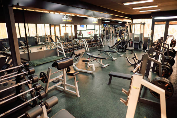 istock Modern gym interior with equipment for exercising and training 2206518456