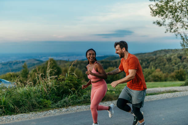 fitness woman trail runner running at great wall on the top of mountain