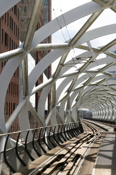 istock Dutch railway bridge on a blue sky day 2206522399