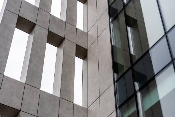 istock Modern concrete and glass building with vertical lines and windows, contemporary minimal design 2206523059