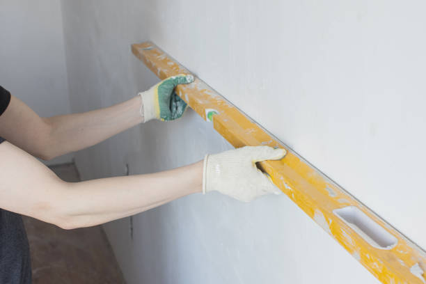 istock Men with spirit level 2206523396