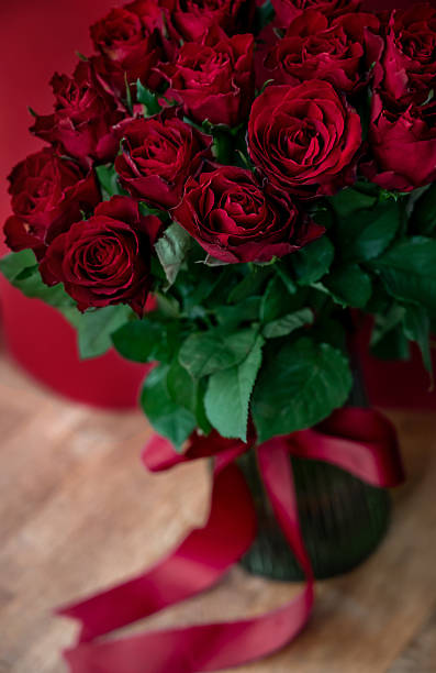istock Bouquet of red roses on a red background. 2206528866
