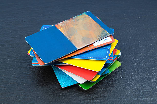 Stack of bank cards on a black background