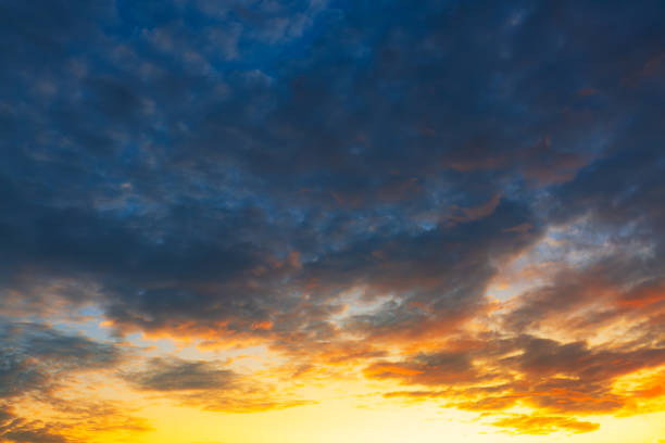 istock Clouds and evening sky,Horizon Golden Sky, Sunrise clouds Gorgeous, Dusk sky,Beautiful dramatic scenic sunset sky background,Sunset Sky on Twilight in the Evening with Orange Gold Sunset Cloud Nature Sky Background, 2206535311