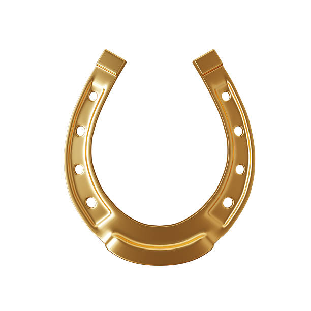 Golden horseshoe isolated on white background