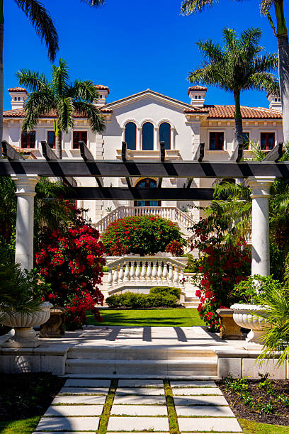 Naples, FL, USA - March 19, 2025: Multimillion dollar mansions in Naples Beach Florida