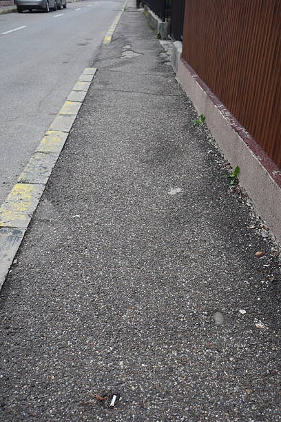 istock Degraded public road accession way 2206539376