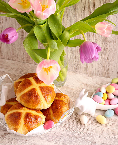 istock Easter sweet treats and cross buns 2206542940
