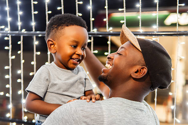istock Father and son sharing a special moment during christmas celebration 2206544491