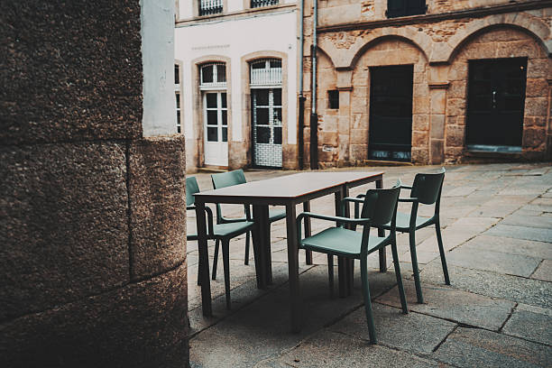 istock Outdoor dining in stone courtyard 2206549227