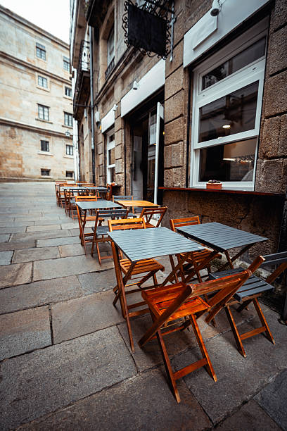istock Empty wooden cafe tables outdoors 2206549297