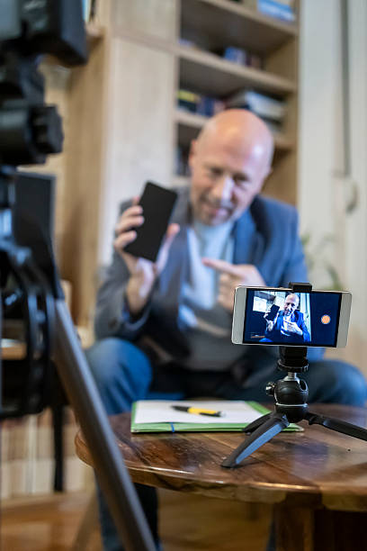 istock An adult influencer recording a tutorial for his blog at home 2206558995