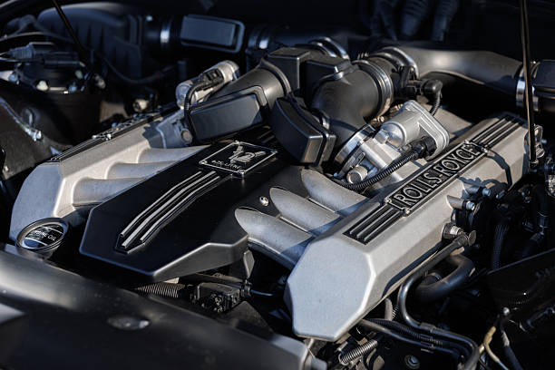Hamburg, Germany - March 23. 2025: The engine compartment of a Rolls-Royce with a 6.75-liter V12 engine, developed and built by BMW. Photographed at a classic car convention in Hamburg.