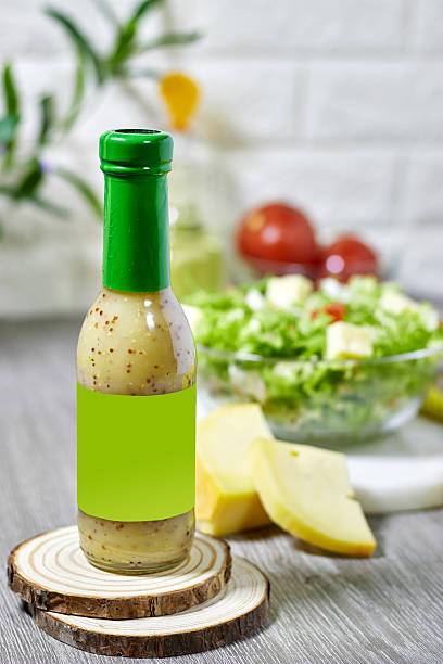 Healthy Green Salad With Cheese and Dressing in a Modern Kitchen Setting