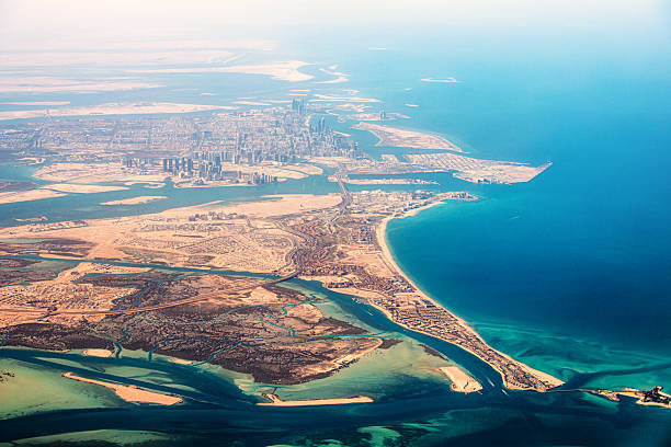 istock Breathtaking aerial perspective capturing Abu Dhabi's modern skyline, artificial islands, and vibrant coastline 2206578354