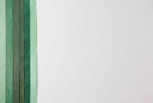 Green and white paper texture background with copy space for text or image.