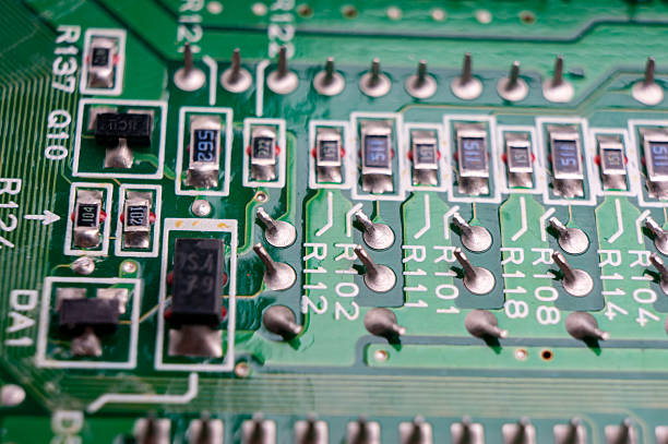 istock electronic circuit board with the back side, on which the soldering and connecting tracks of radio components are located 2206585606