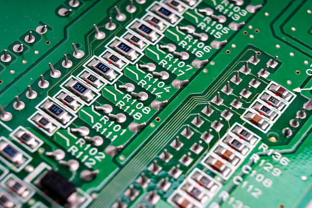 istock electronic circuit board with the back side, on which the soldering and connecting tracks of radio components are located 2206585631