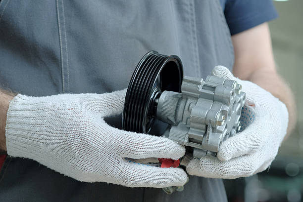 istock Auto parts.Replacing the power steering pump. 2206585689