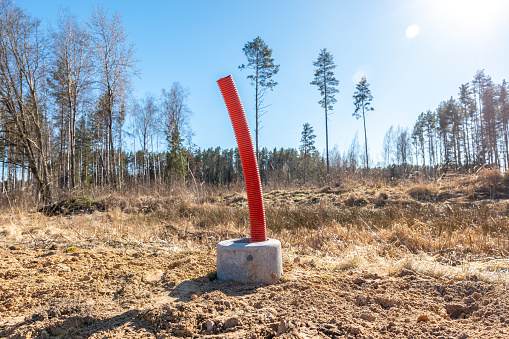 Red Conduit Tree Construction Site With Red Conduit For Light Pole Installation Stock ...
