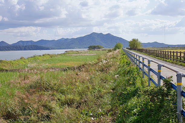 istock Yeongsangang Bike Path Overlooking River and Mountains 2206592557