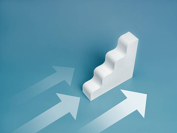istock Arrows heading straight ahead near white stair steps object as business growth graph, isolated on blue background. Business goal, progress and leadership vision, effort leads to success concepts. 2206593361