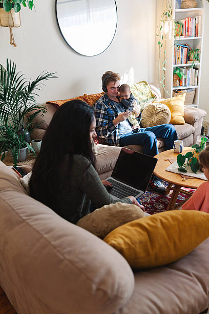 istock Diverse Family Using Internet Technology In Living Room 2206599351