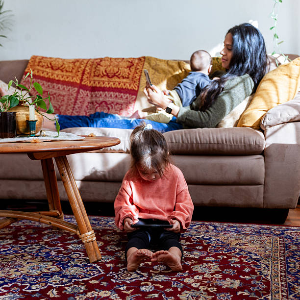 istock Diverse Family Using Internet Technology In Living Room 2206599357