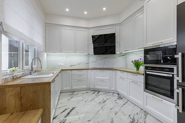 istock Modern White Kitchen with Wooden Accents 2206605140